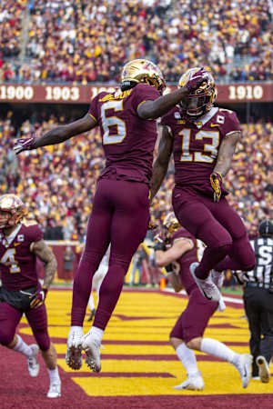 Nov 9, 2019; Minneapolis, MN, USA; Minnesota Golden Gophers wide receiver Rashod Bateman (13) celebrates with wide receiver Tyler Johnson (6) after scoring a touchdown in the first quarter against the Penn State Nittany Lions at TCF Bank Stadium. Mandatory Credit: Jesse Johnson-USA TODAY Sports